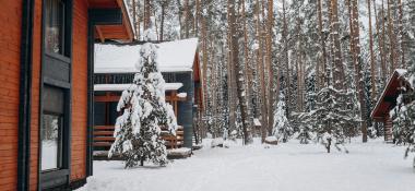 Exterior of a ski lodge in snowy woods
